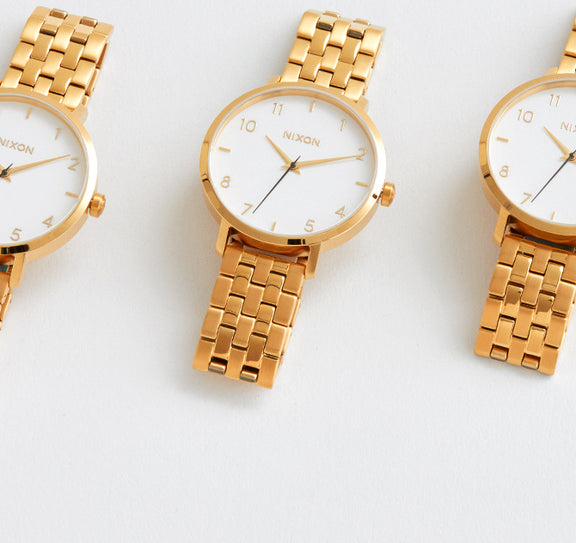 3 gold Nixon watches as wedding gifts for women